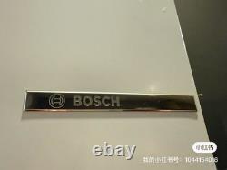 Réfrigérateur et congélateur Bosch, KGN27NWFAG. Bosses sur la porte du congélateur.