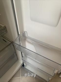 Réfrigérateur et congélateur Kenwood à deux portes avec distributeur d'eau argenté en bon état de fonctionnement