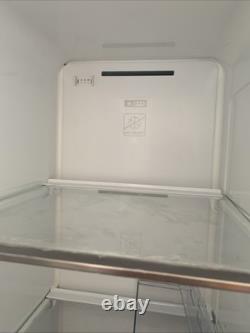 Réfrigérateur et congélateur Kenwood à deux portes avec distributeur d'eau argenté en bon état de fonctionnement