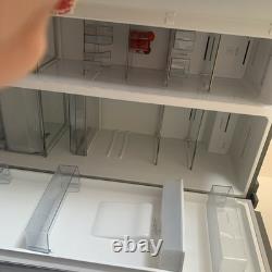 Réfrigérateur et congélateur Kenwood à deux portes avec distributeur d'eau argenté en bon état de fonctionnement