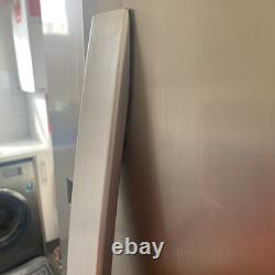 Réfrigérateur et congélateur avec distributeur d'eau Kenwood à deux portes argenté en bon état de fonctionnement